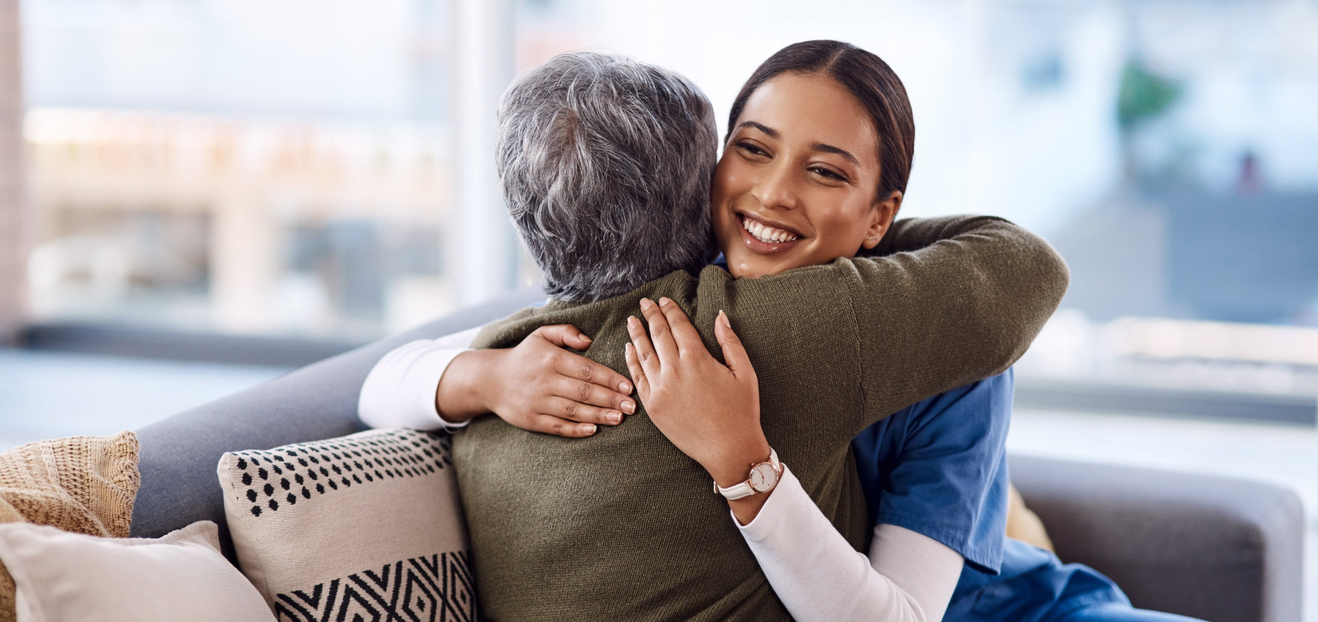 nurse hugging elder