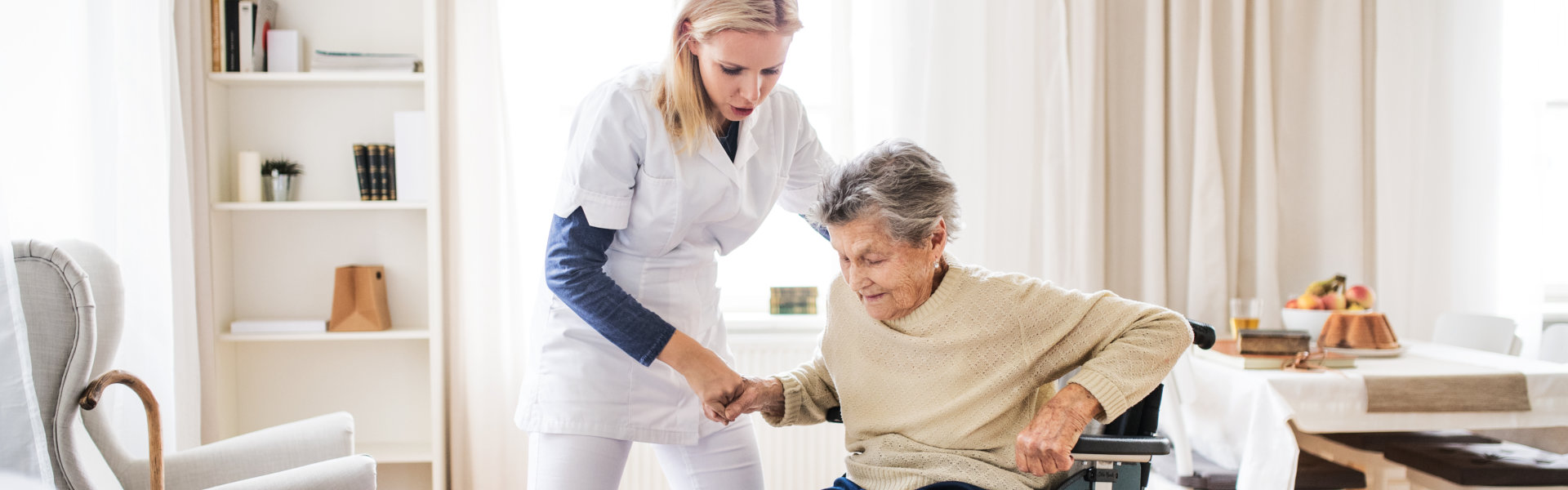 nurse assisting elder