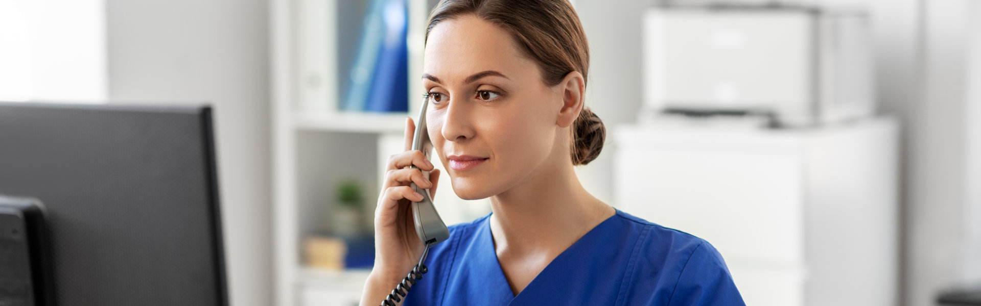 nurse holding phone