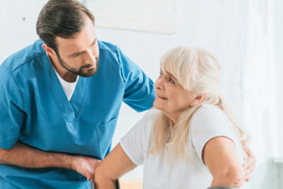 nurse assisting elder