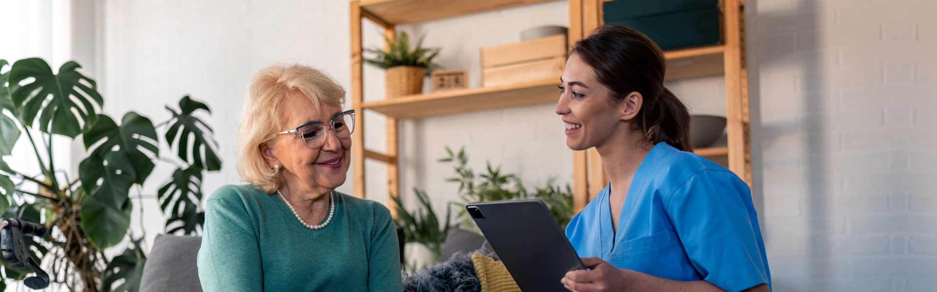 nurse holding clip board with elder